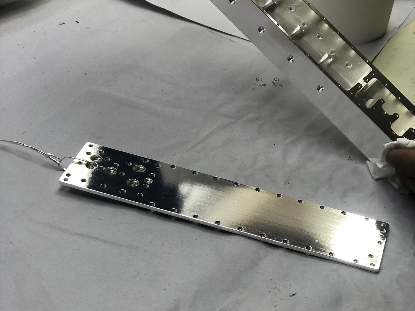 Cover plate, with its housing behind