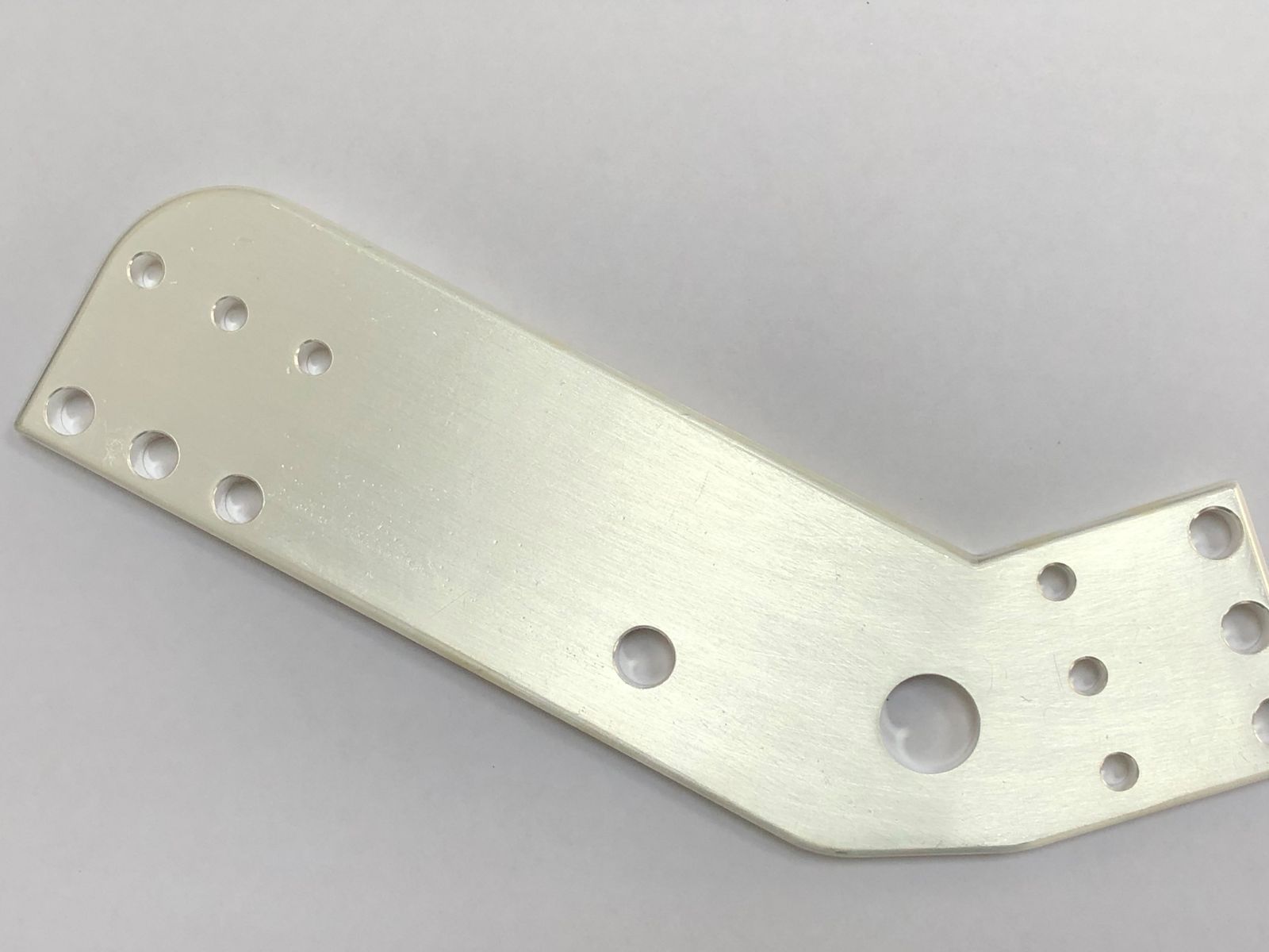 Silver-plated bent copper busbar with bolt holes, for switchgear